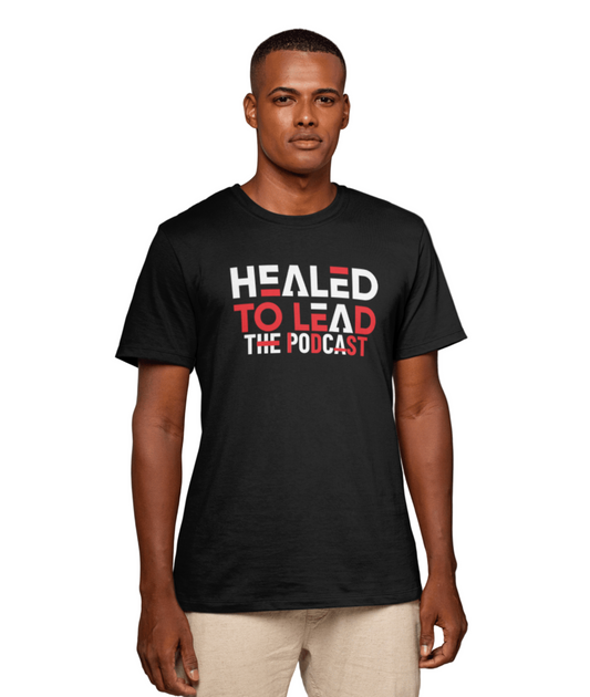 Man wearing a black t-shirt with 'Healed to Lead The Podcast' text on a gray background